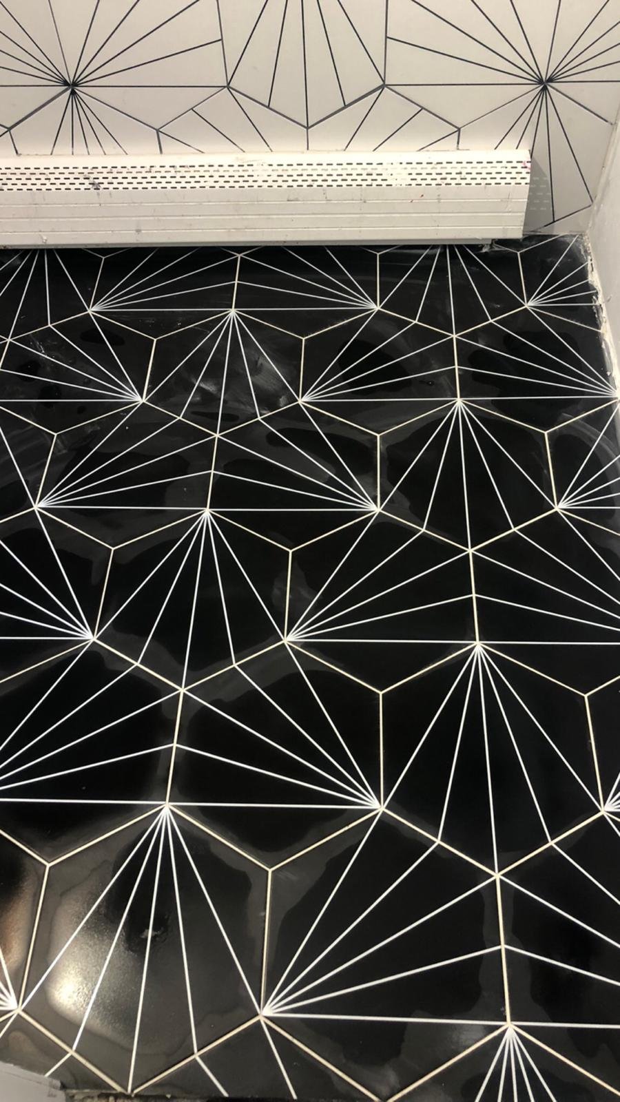 Completed custom tile installation by Souza Installation